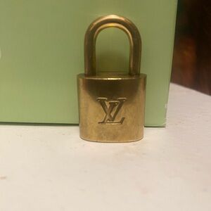 Louis Vuitton Gold Padlock/ No key